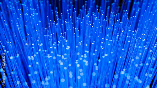 3D Render Fiberoptic cables glowing neon blue
