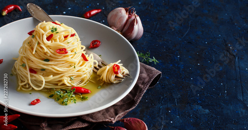 Spaghetti with garlic, olive oil and hot red pepper photo