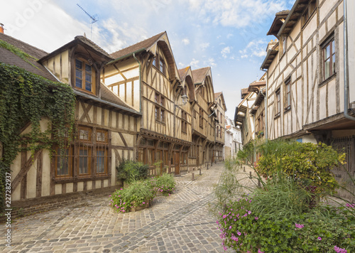 Alley with medieval houses at the old town of Troyes, Fracne