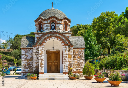 Olympiada, Greece - August 18, 2018: St. Nicholas church at the beach of the town Olympiada in Chalkidiki in Greece