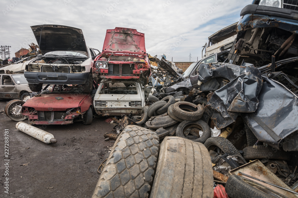 Cars at the junkyard waiting for recycling Cars at the junkyard waiting for recycling