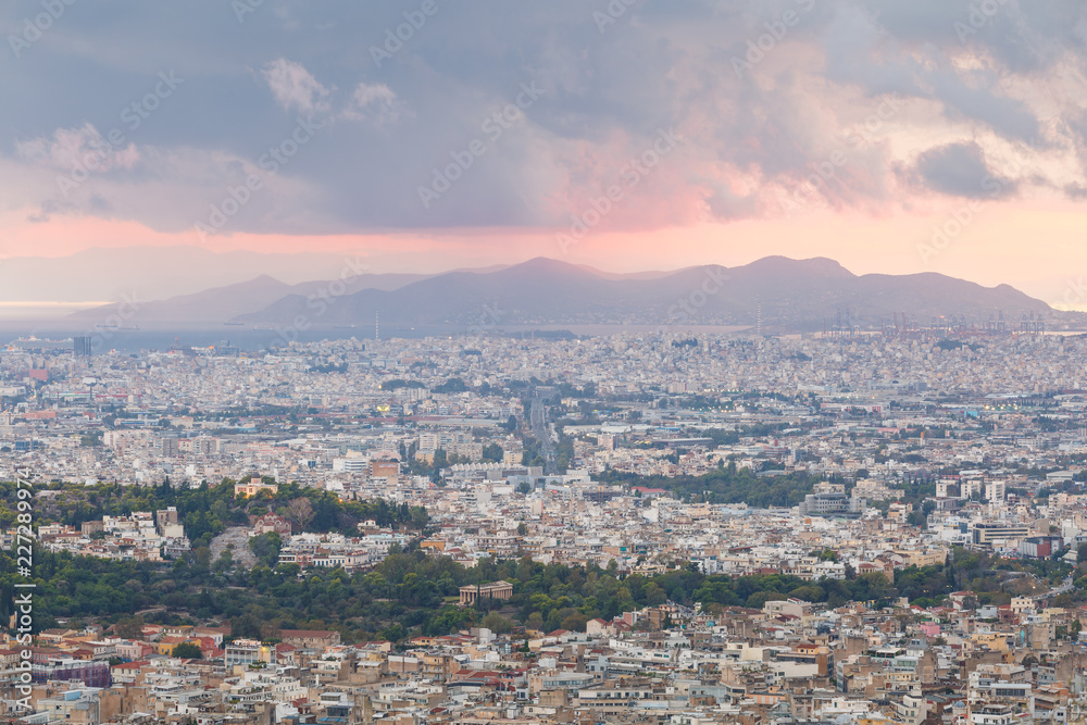 View of Athens and Salamina island from Lycabettus hill at sunset, Greece. 
