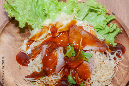 egg noodle soup with red roasted pork and sauce
