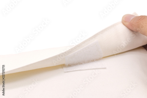 A finger open velcro canvas bag on isolated background.