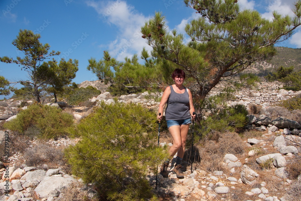Hiking on the trail from Lefkos to Mesochori on Karpathos in Greece
