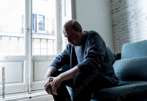 Photography Sad unhappy old senior man suffering from memory loss and alzheimer feeling depr