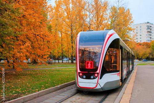 public transport, modern city tram, approaching the bus stop Moscow, Russia