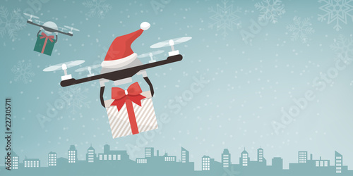 Drones with Santa's hat delivering Christmas gifts