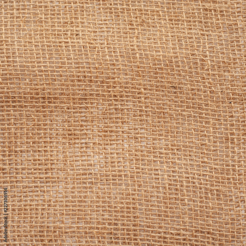 burlap woven texture pattern background in yellow beige cream brown color, copyspace . One thousand one hundred eleven burlap woven texture pattern background in yellow beige cream brown color, copyspace . One thousand one hundred eleven