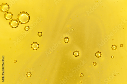 background air bubble out of yellow liquid