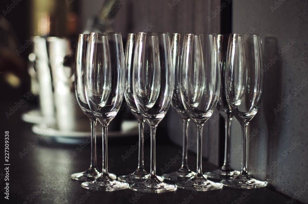 empty wine glasses on table. flutes glasses empty wine glasses on table. flutes glasses
