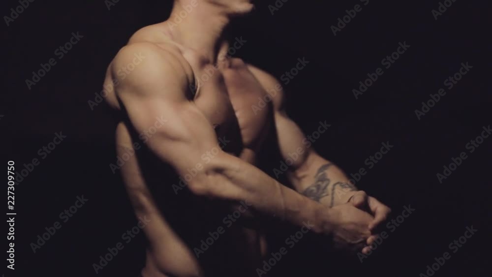Beautiful Body Of A Young Man. Guy Flexing Arms, Torso. Beautiful Body Of A Young Man. Guy Flexing Arms, Torso.