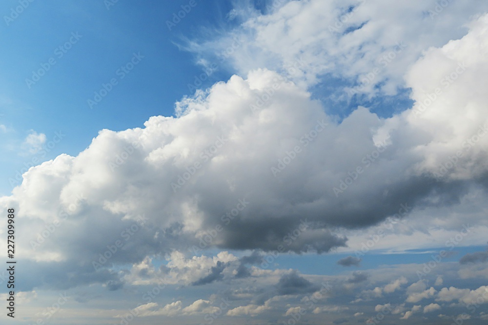 Beautiful cumulus clouds in blue sky, natural background Beautiful cumulus clouds in blue sky, natural background