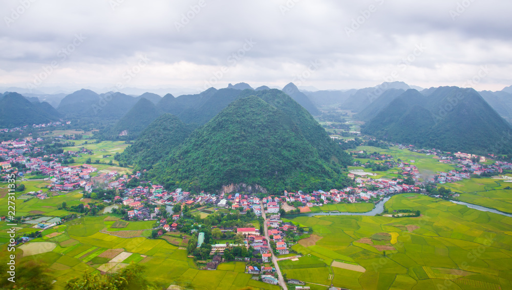 Bac Son mountain from top view to a small town and rice field in Vietnam Bac Son mountain from top view to a small town and rice field in Vietnam