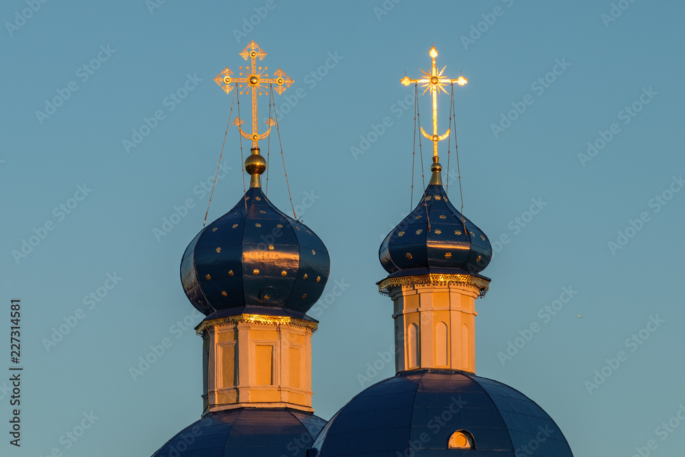 View of the Petropavlovskaya Church in the fall in Yasenevo at sunset.