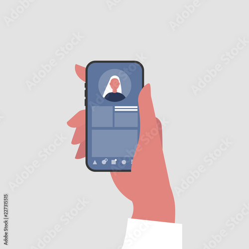 Social media profile. Hand holding a smartphone. Millennial lifestyle. Communication technologies. Flat editable vector illustration, clip art