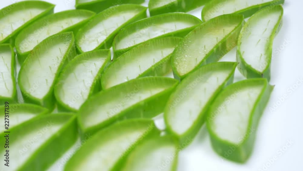 Fresh aloe vera slice is slowly rotating in the studio with the details. Fresh aloe vera slice is slowly rotating in the studio with the details.