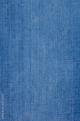 Jeans material with a rough texture blue color.