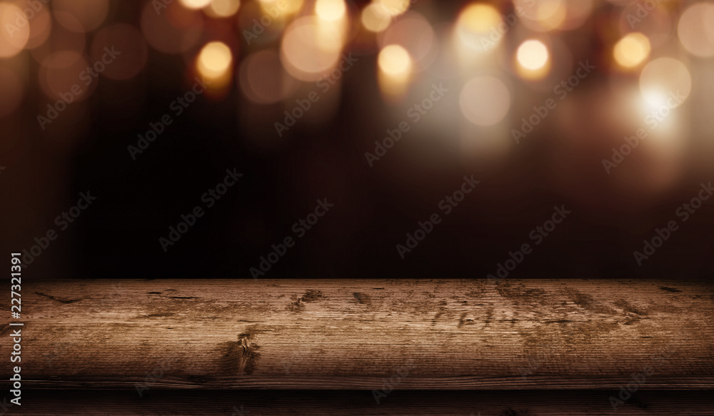 Christmas bokeh background and wooden table - obrazy, fototapety, plakaty 