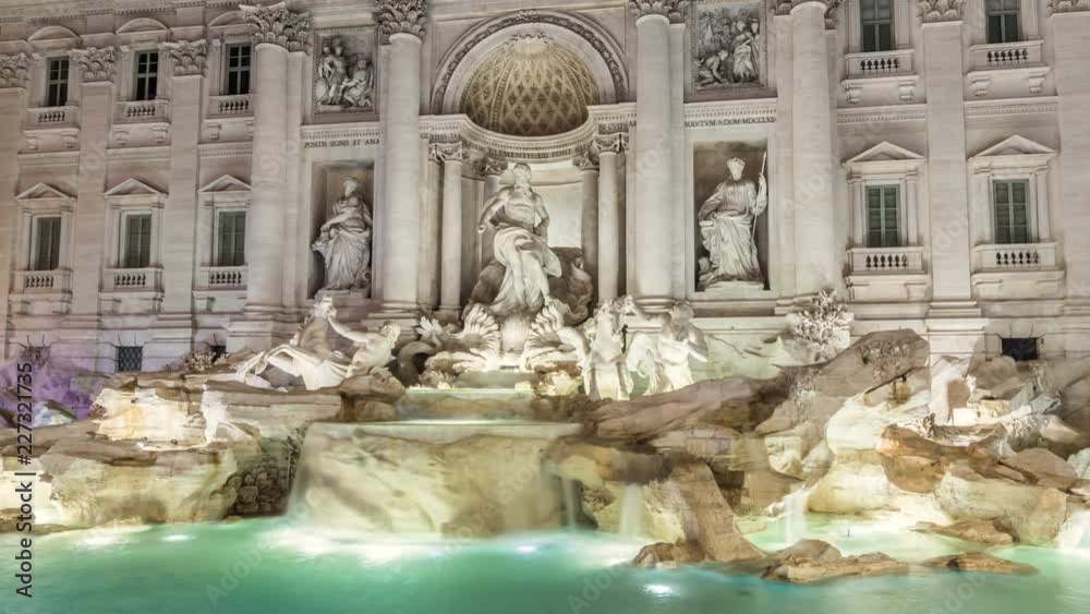 Illuminated Fontana di Trevi (Trevi Fountain) at night. This famous Baroque fountain is one of the most visited landmarks of Rome, Italy. Illuminated Fontana di Trevi (Trevi Fountain) at night. This famous Baroque fountain is one of the most visited landmarks of Rome, Italy.