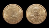 Coin one US dollar (Sacagawea Dollar) on a black background