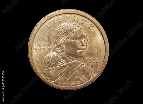 Coin one US dollar (Sacagawea Dollar) on a black background photo