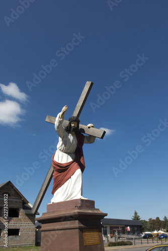 Christ statue with a cross in Wachock in Poland photo