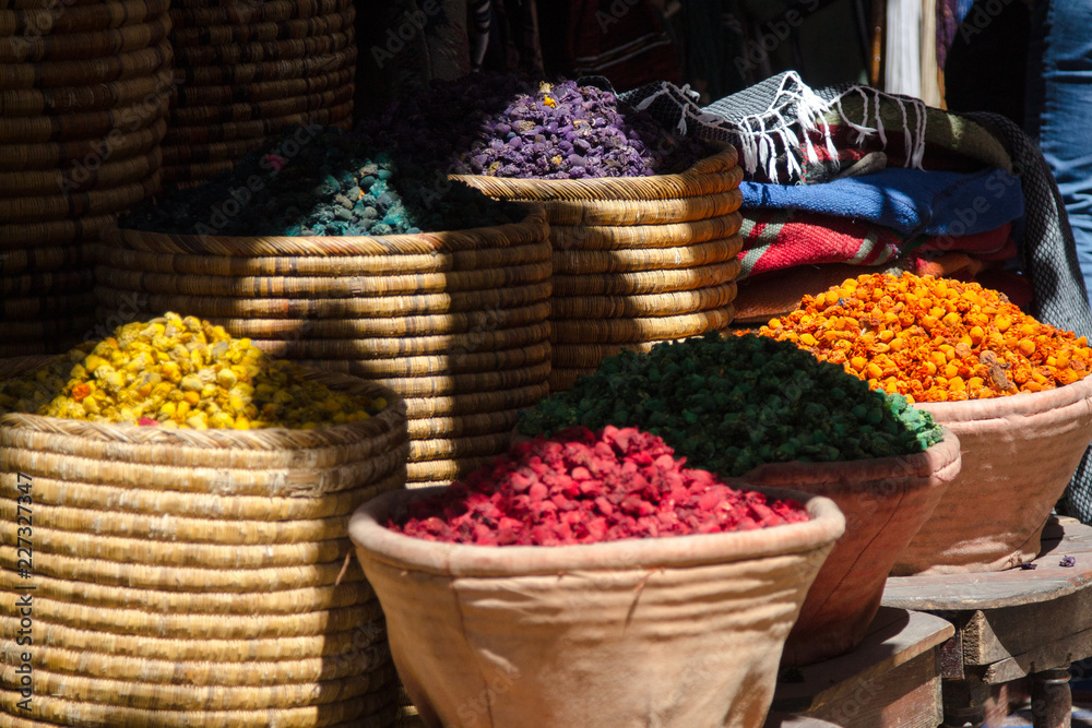 Large wicker baskets with dried flowers on the market in the medina of Marrakesh. Africa Morocco
