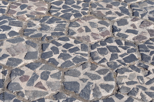 Construction Materials. Covering the roadway with pentagons of concrete and granite