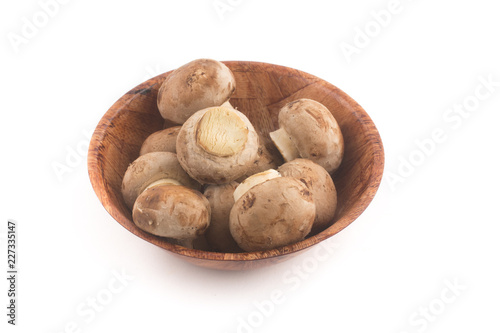 Fresh champignon mushrooms in a bowl