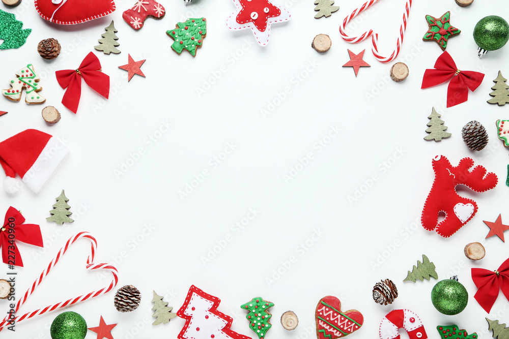 Christmas decorations with gingerbread cookies on white background Christmas decorations with gingerbread cookies on white background