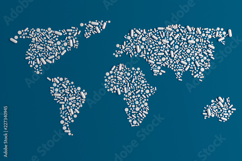 Background of scattered on a plain blue background of many tablets in the form of a silhouette of the continents of the world 3d illustration
