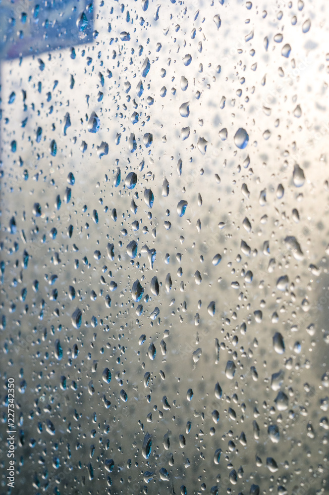 Obraz premium background of raindrops on window glass, close up