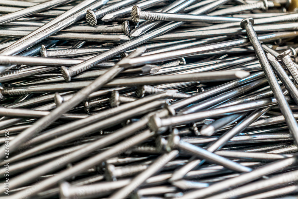 Abstract texture, close-up of nails for wood. Shallow depth of focus.