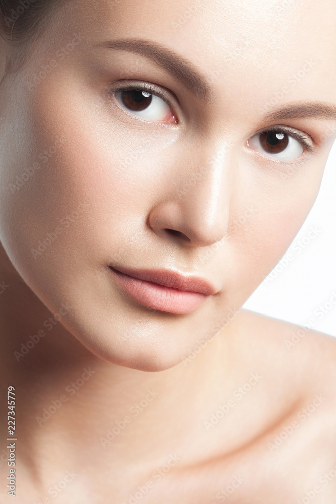 Young beautiful woman with clean perfect skin close-up Young beautiful woman with clean perfect skin close-up