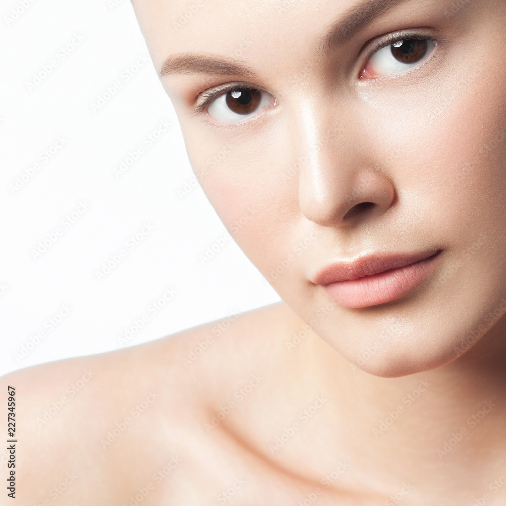 Obraz premium Young beautiful woman with clean perfect skin close-up