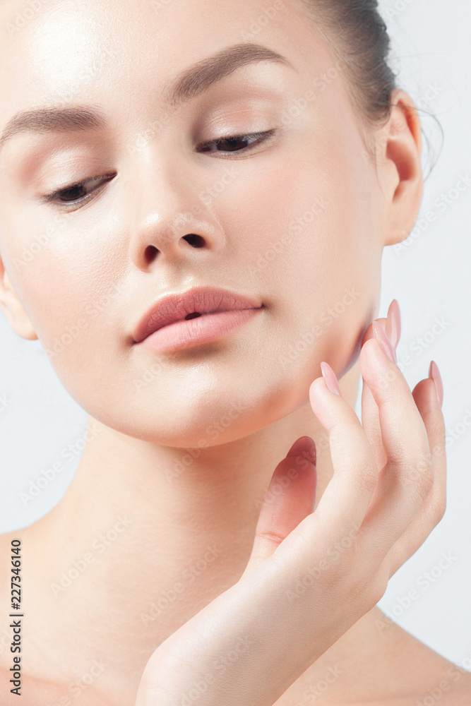 Young beautiful woman with clean perfect skin close-up Young beautiful woman with clean perfect skin close-up
