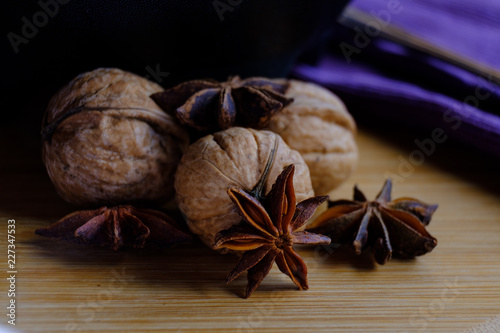 Fototapeta Naklejka Na Ścianę i Meble -  Still life with star anise and walnuts