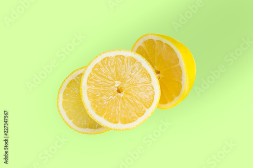 Slices of lemon citrus isolated cut out view from above