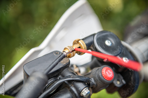 Lubricating motorcycle braking cables