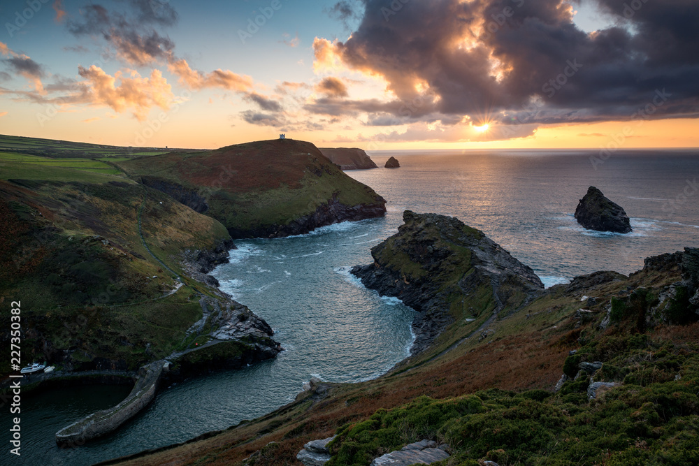 Sunset over sea at Boscastle on the North coast of Cornwall, UK