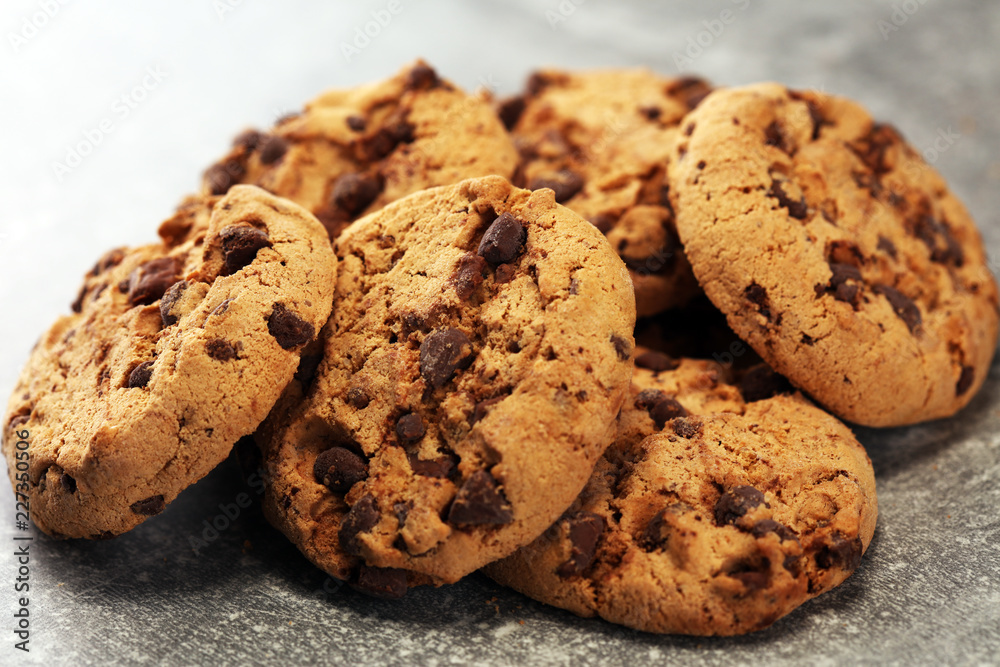 Chocolate cookies on rustic table. Chocolate chip cookies shot Chocolate cookies on rustic table. Chocolate chip cookies shot