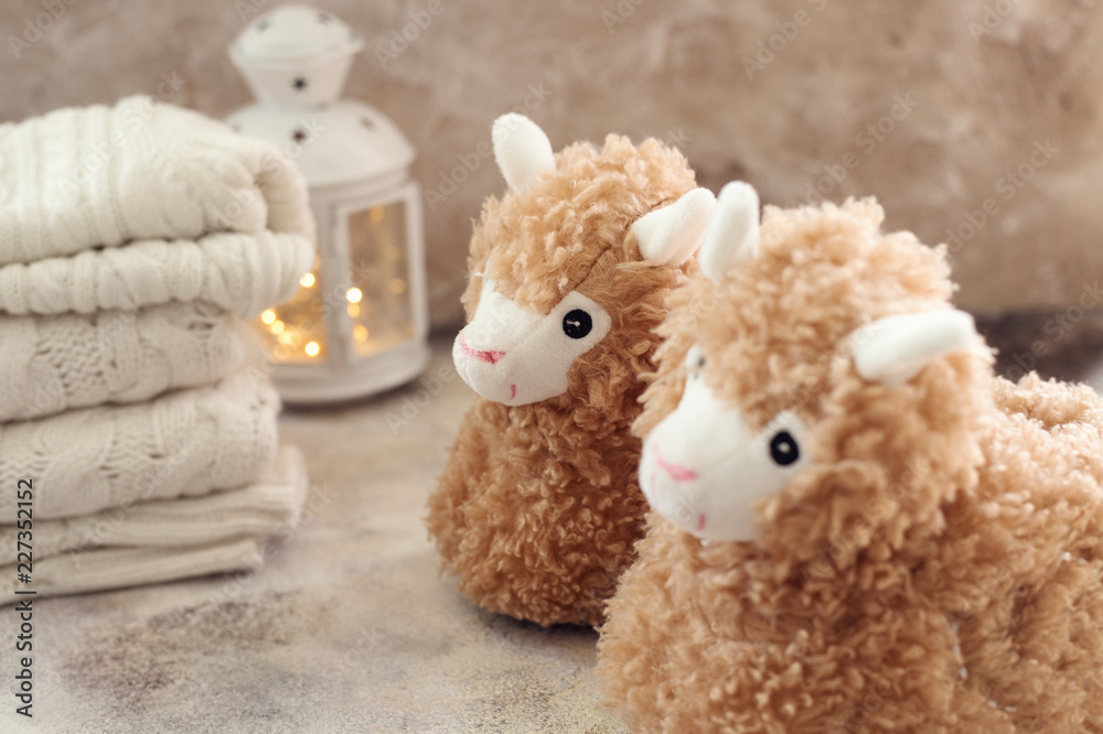 Fototapeta premium llama trendy slippers soft pastel colours beige