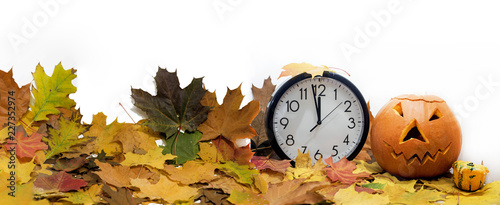 Isolated electronic wall clock. Autumn abstraction. Fall back time
