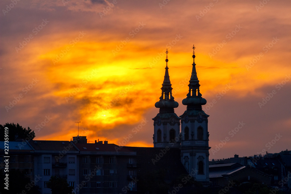 Sunset over the historical district and church in Budapest city, Hungary