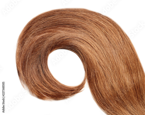 Lock of healthy red hair on white background