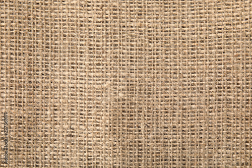 Sustainable hemp fabric as background, top view
