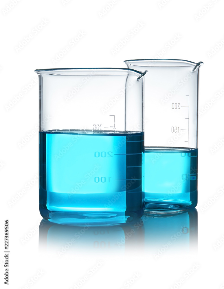 Beakers with liquid on table against white background. Laboratory analysis Beakers with liquid on table against white background. Laboratory analysis