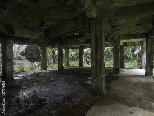 Fototapeta Naklejka Na Ścianę i Meble -  Remains of a World War II Japanese military command centre on Eten Island in Chuuk State (formerly Truk Lagoon), Micronesia