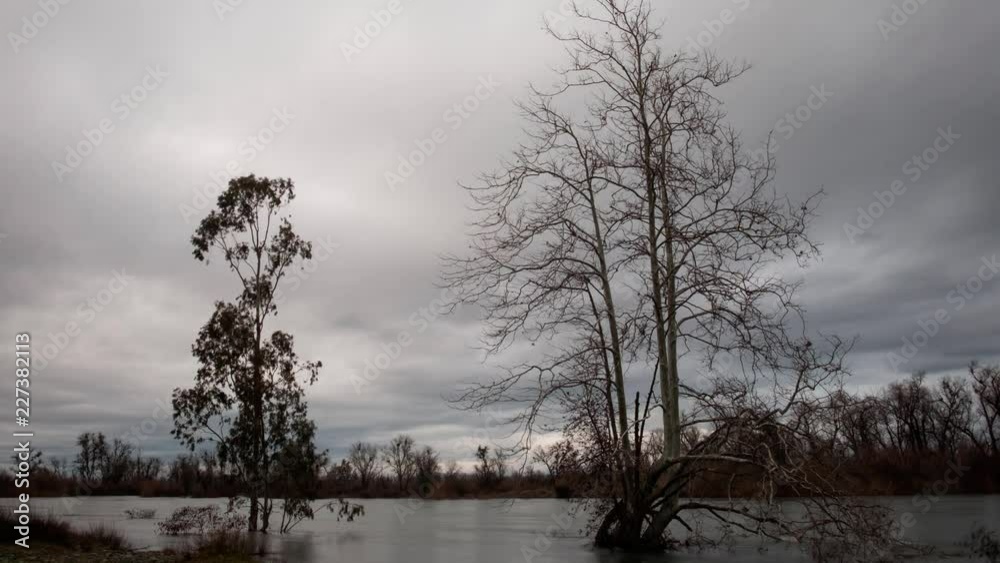 4k Day to Night Nature Landscape Timelapse of a Storm Moving Over The Feather River in Oroville, California.